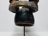 an image of a sculpture of a head made out of wood