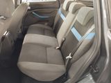 the back seats of a car with a blue stripe on it
