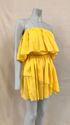 yellow ruffled dress on mannequin mannequin mannequin mannequin mannequin mannequin mannequin mannequin mannequin