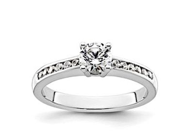 an engagement ring with a diamond set in the center