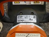 a close up of a moped with a sticker on it