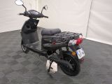 a scooter that is parked in a room