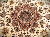 an image of a large oriental rug on a wooden floor