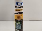 a close up of a tube of glue sitting on a table