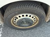 a close up of a tire on the side of the road