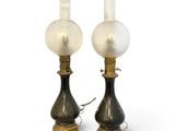 pair of brass and glass table lamps with frosted glass globes