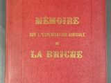 la couverture d'un livre rouge orné d'une inscription dorée