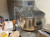 an image of a kitchen with a mixer and other items