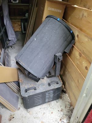 a trash can sitting in the corner of a room