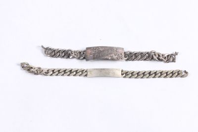 two silver bracelets with a silver clasp and a silver chain