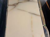 marble slabs are stacked on top of each other in a room