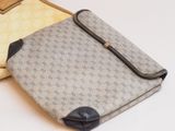 a bag that is sitting on a table next to another bag