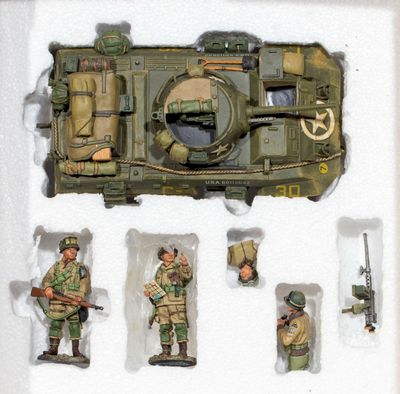 a picture of a toy army set in a display case