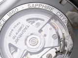 a close up of a wrist watch with a black strap