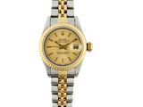 une montre Rolex pour femme avec un cadran bicolore en or