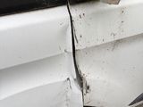 an image of a car that has been badly damaged