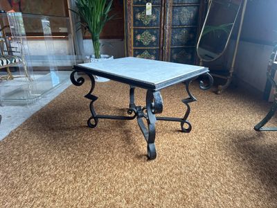 a table that has a marble top on it