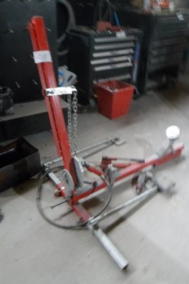 a picture of a red jack in a garage