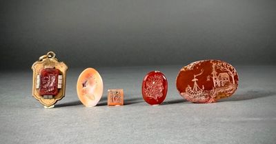 three pieces of glass with a picture of a man and a woman on them