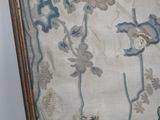 a picture of a cat that is sitting on a rug