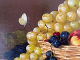 a painting of a basket of grapes and apples on a table