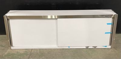 an image of a white refrigerator in a room