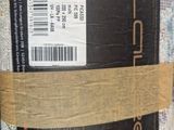 a close up of a roll of fabric with a label on it