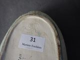 a picture of a close up of a shoe with a label on it