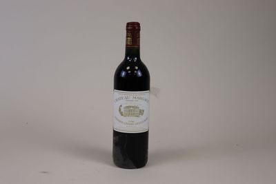 a bottle of wine that is sitting on a table