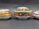 several different types of vases are lined up on a table
