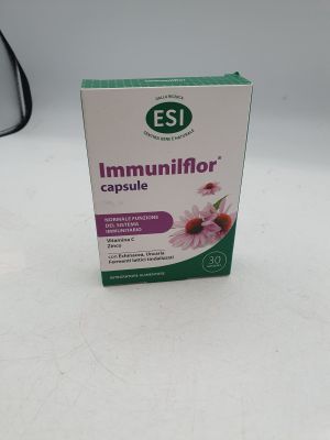 une boîte de gélules « esi immunifor » posée sur une table