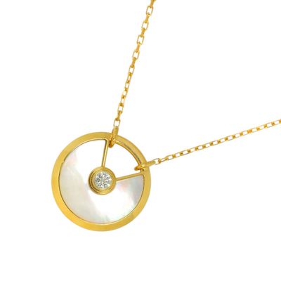 Cartier Modèle : Amulette XS Matière : Or jaune 18 carats (1…