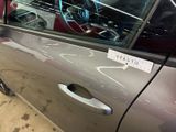 a sticker on the door of a car with a sticker on it
