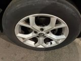a close up of a tire on a car