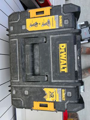 a tool box that is sitting on top of a tool stand