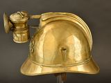 a gold helmet with a camera attached to it