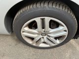 a close up of a tire on a car ' s rim