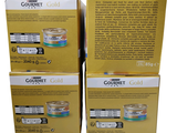 deux boîtes de nourriture pour chat « Gourmet Gold » empilées l'une sur l'autre