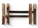 an image of a close up of a metal object on a white surface