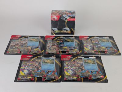 un lot de six cartes Pokémon empilées les unes sur les autres