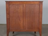an image of a wooden cabinet with two doors on one side and a drawer on the other