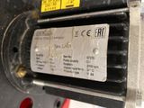 a label on the back of a machine that is sitting on a table