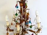 a chandelier that has a bunch of lights hanging from it