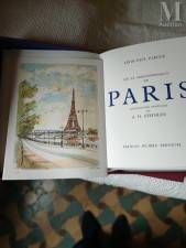 une photo d'un livre sur laquelle figure une image de la tour Eiffel