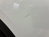 a close up of a car ' s windshield with a sticker on it