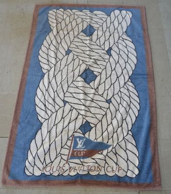 a blue towel with a picture of a bear on it