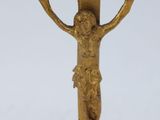 an image of a gold cross with a crucif on top of it