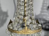 a chandelier hanging from the ceiling in a room