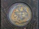 a plaque with a picture of a man and a woman on it