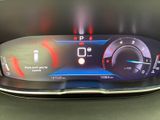 the dashboard of a car with a digital display on it